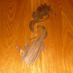 Cockpit table with teak seahorse inlay